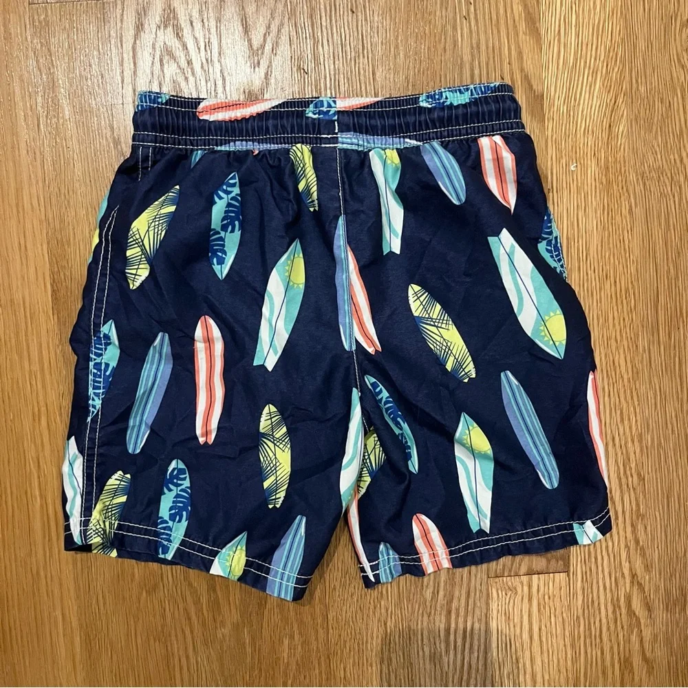 [3 for $15] CARTER’S Kids Swim Trunks - Navy with Multicolor Surfboards (5T) - Picture 2 of 4